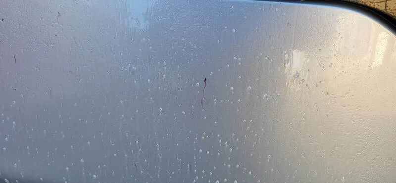 Fallout remover breaking down and removing embedded iron and metal contamination from the KIA paintwork