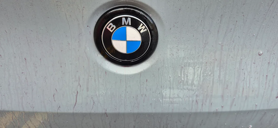 The BMW X4 paint chemical decontamination process removes embedded iron particles using specialised chemical sprays