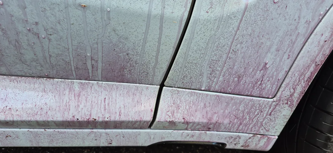 The BMW X paint chemical decontamination process removes embedded iron particles and road tar using specialised chemical sprays