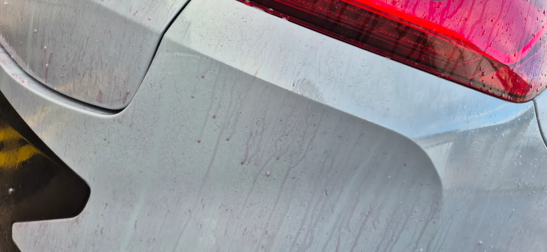 The car paint chemical decontamination process removes embedded iron particles and road tar using specialised chemical sprays