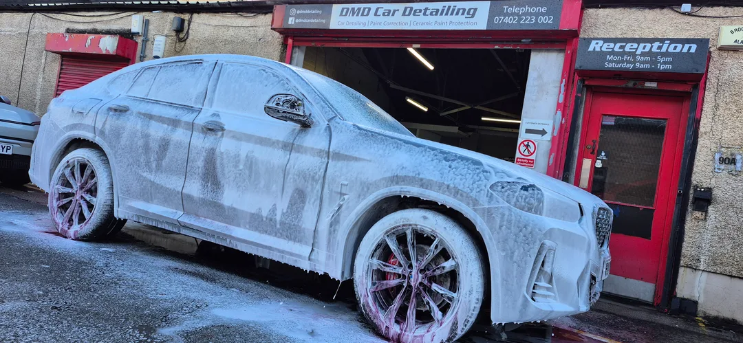 The snow foam process involves mixing a pre-wash detergent, applying it with a pressure washer lance from the bottom up, letting it dwell to lift dirt, and rinsing thoroughly.