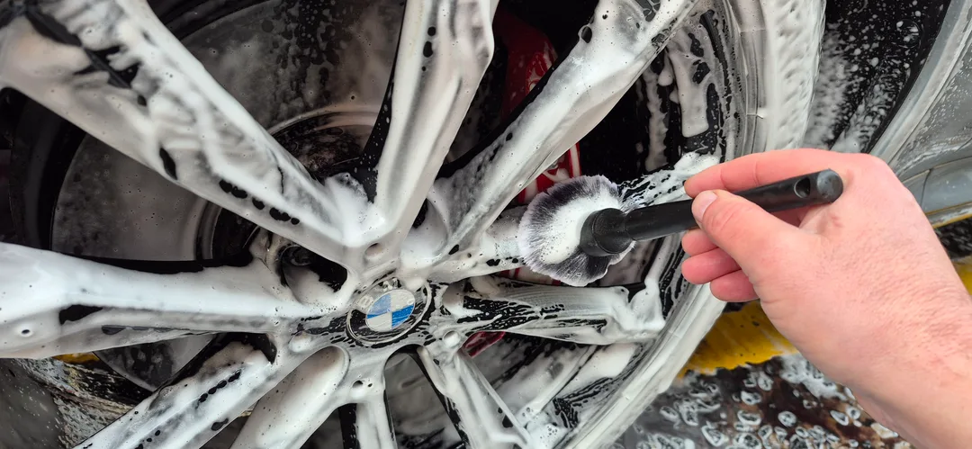Alloy wheel detail on BMW X4 during detailing process
