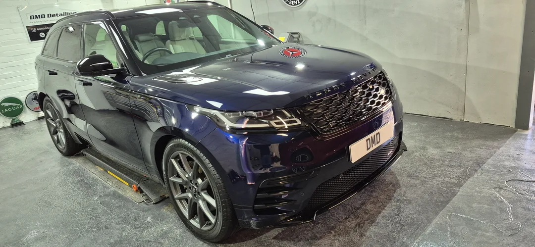 Range Rover Velar P400 bonnet reflecting workshop lights after ceramic coating