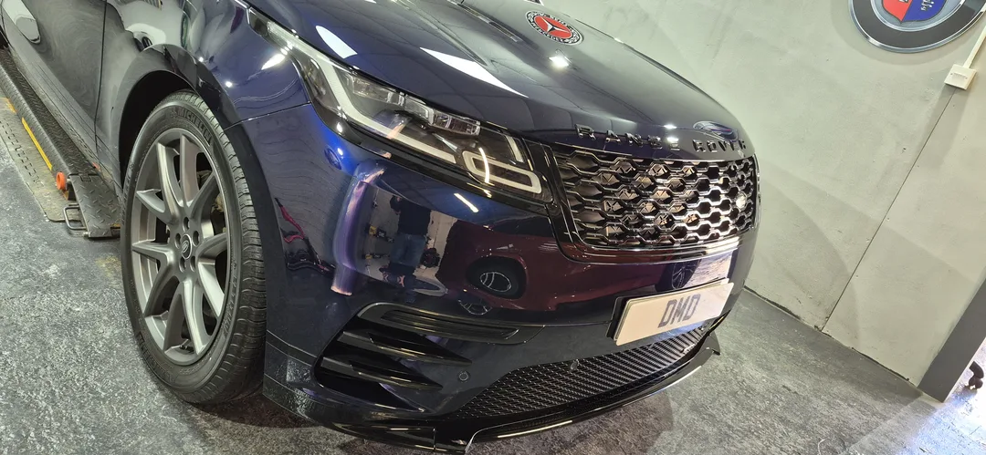 Glossy finish on this portofino blue range rover after paint correction
