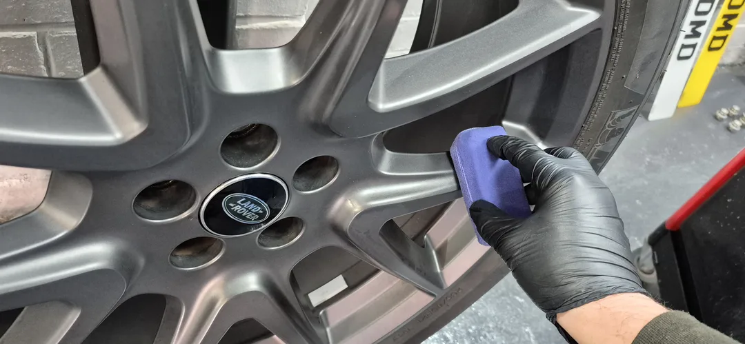 Range Rover Velar wheel being ceramic coated in Paisley near Glasgow at DMD Car Detailing