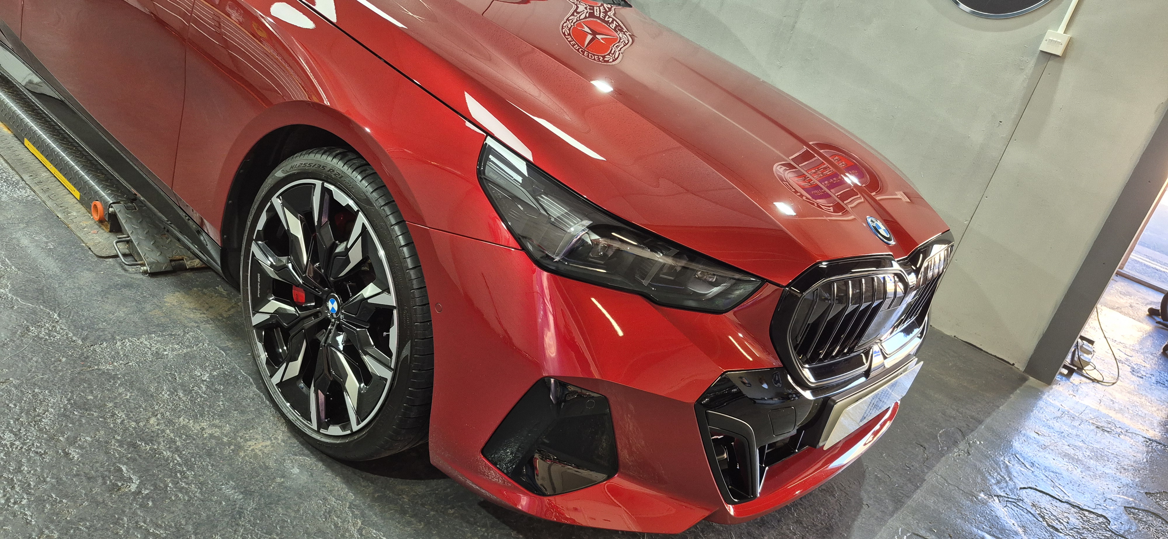 Fire Red BMW i5 after new car ceramic coating in Paisley