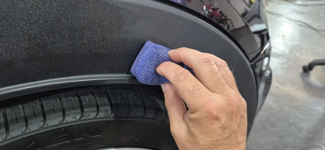 Ceramic coating being applied to exterior trim on Mini Cooper at DMD Car Detailing in Paisley near Glasgow