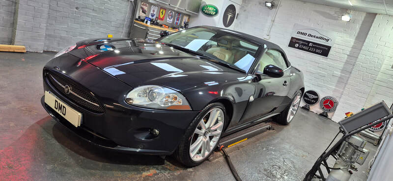 Sapphire Black Jaguar XK 4.2 V8 after single stage polish and ceramic coating in Paisley at DMD Car Detailing near Glasgow