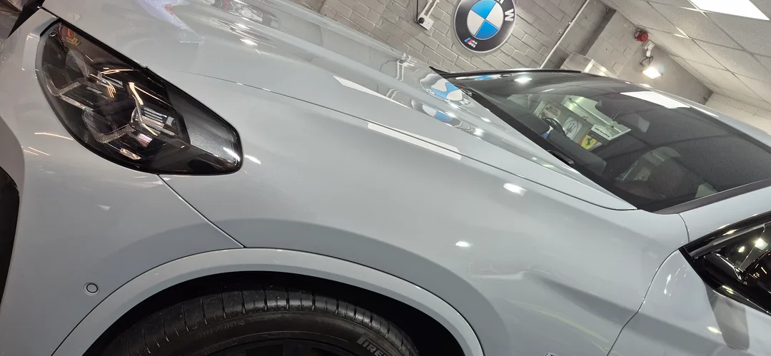 Nearside wing panel of BMW X4 after full detail and ceramic coating