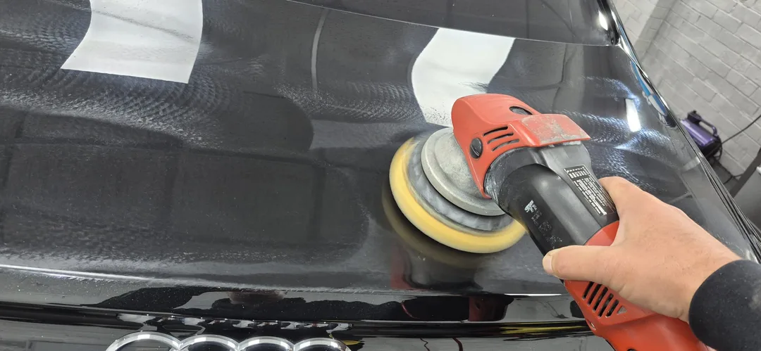 Mythos Black Audi A8 being machine polished at DMD Car Detailing in Paisley
