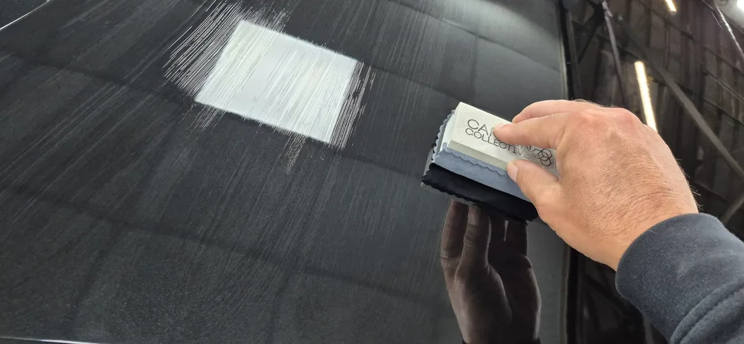 Ceramic coating being applied to bonnet of the Mythos Black Audi A8 Quattro