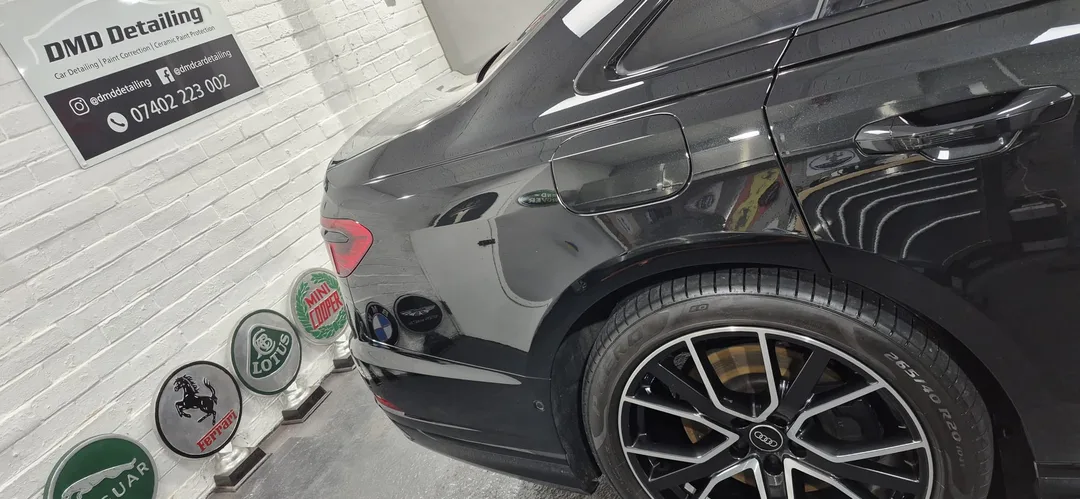 Audi A8 rear three-quarter view after two-stage machine polish, Paisley detailing