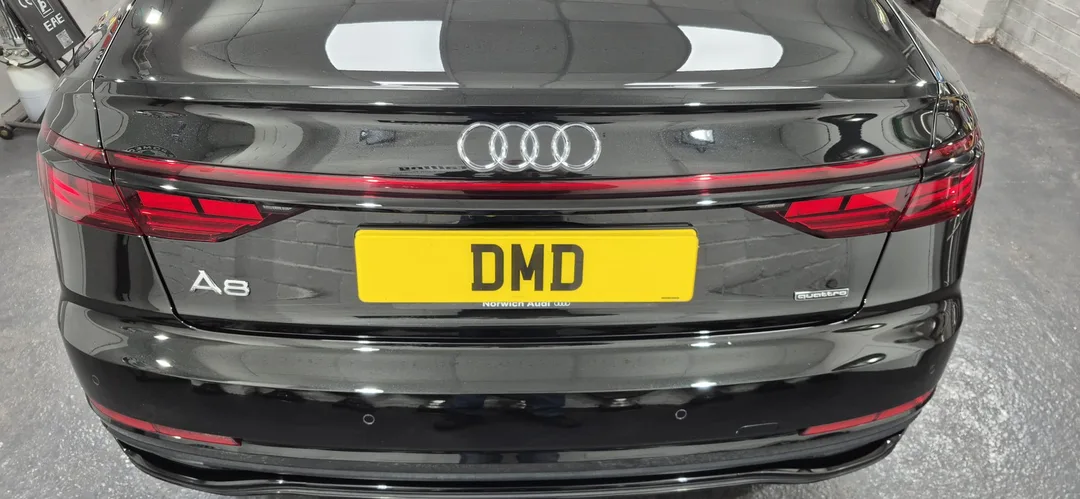 Reflective finish on Audi A8 Quattro tailgate after ceramic coating